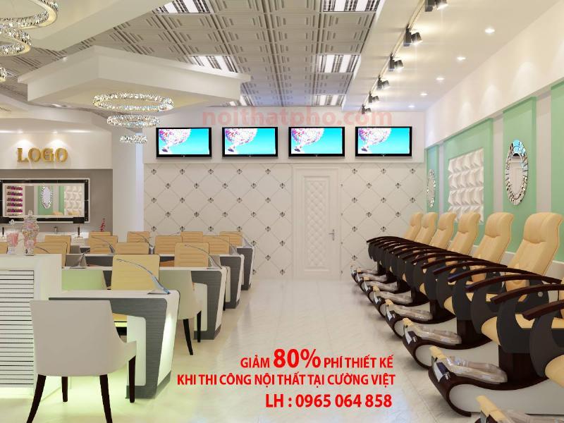 Một góc phòng khách với ghế sofa và một vài chậu cây cảnh kích thước khác nhau được bố trí hợp lý, thể hiện cách tích hợp cây xanh vào nội thất Hygge